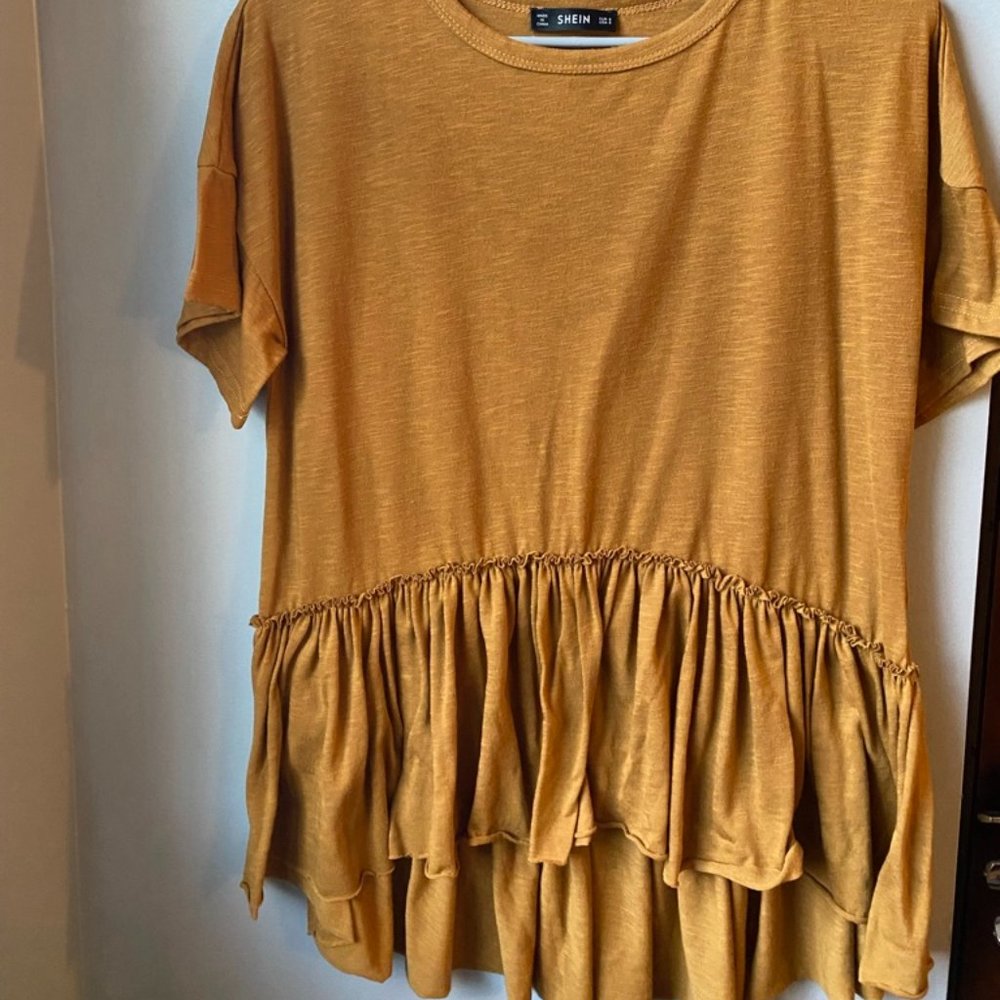 Yellow frilly shirt